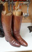 A pair of lady’s brown leather riding boots, with trees