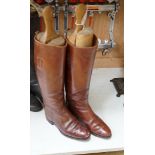 A pair of lady’s brown leather riding boots, with trees