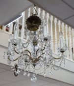 A cut glass six branch chandelier, 52cms high,