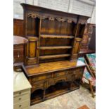 An 18th century style mahogany banded oak potboard dresser with boarded rack, width 167cm, depth