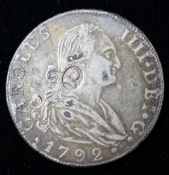 A contemporary copy? - a George III silver dollar, head of George III countermark on a replica of