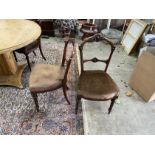 A set of four Victorian walnut dining chairs
