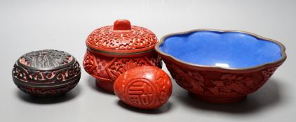 A Chinese cinnabar lacquer bowl, a similar covered box and egg, and a carved circular box and cover