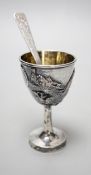An early 20th century Chinese Export white metal dragon ‘egg’ cup and spoon, by Zee Shun,, cup