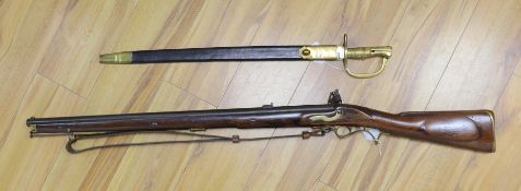 A Brown Bess East India Company musket, refubished, with later bayonet