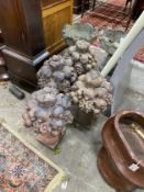 A set of four earthenware fruiting vase finials, possibly Lefco Ware, height 56cm