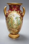 A 19th century English bone china two handled vase, decorated with a central cartouche, in