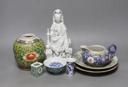 An 18th century Chinese Dehua blanc de chine Guanyin group, 23cm high, together with other various