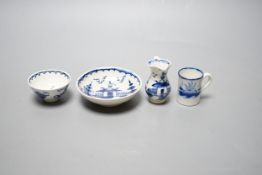 A late 18th century pearlware blue and white miniature jug, 5cm, and tea bowl and an English