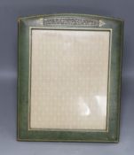An early 20th century tooled photograph frame with inset Chinese pierced bowenite jade panel, 43cm