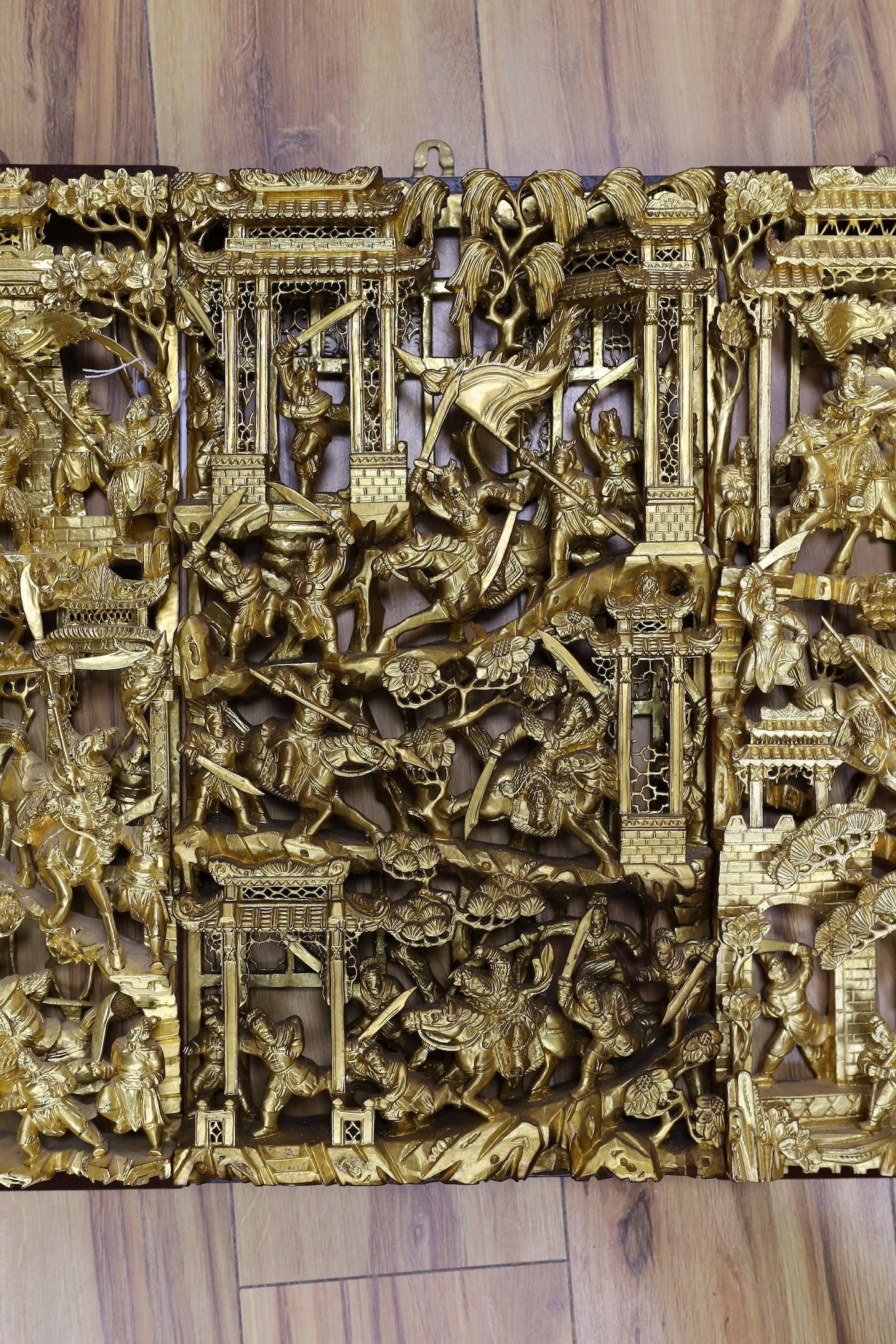 Three Chinese carved giltwood ‘warriors’ panels, largest 48 cm X 25 cm - Image 3 of 4