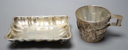A Greek 900 standard white metal cup, embosses with cattle, height 66mm and a similar dish, gross