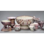 A group of early 19th century pink lustre vases and jugs and a junket bowl