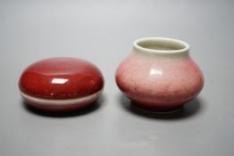 A Chinese sang de boeuf glazed seal paste box and a small pot (2) box 7.5cm diameter