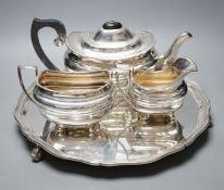 A George VI silver three piece tea set and circular tray, S. Blanckensee & Son Ltd, Chester, 1937/