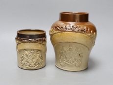 Two 19th century salt glazed stoneware storage jars, with Royal coat of arms sprigging, Tallest 18cm