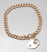 A 9ct gold curblink bracelet, with heart shaped padlock clasp, approx. 19cm, 20 grams.