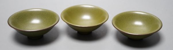 Three Chinese teadust glazed dishes, 8.5cm diameter