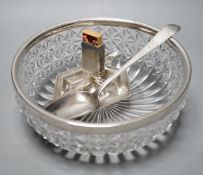 A George III Irish bright cut engraved silver tablespoon, Dublin, 1798, a silver match sleeve/