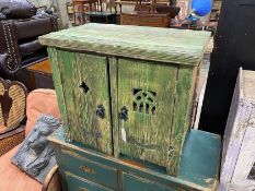 A small Gothic style painted pine two door cupboard, width 66cm, depth 41cm, height 57cm