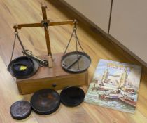 A quantity of various weighing scales, pots and prints