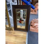 An early 20th century rectangular etched and reverse painted wall mirror width 45cm, height 76cm.