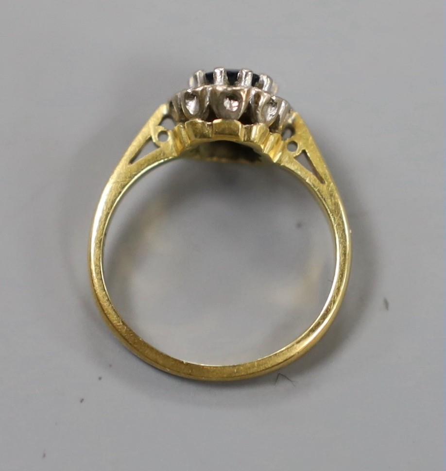 A modern 18ct gold, sapphire and diamond chip set oval cluster ring, size G, gross weight 3.1 - Image 3 of 3
