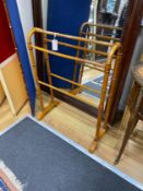 A late Victorian faux bamboo towel rail, height 83cm