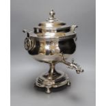 A 19th century silver plated tea urn, Egyptianesque handles, 43cm