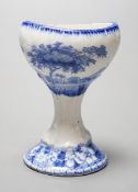 A Spode blue and white transfer printed pottery eye bath, early 19th century decorated with a