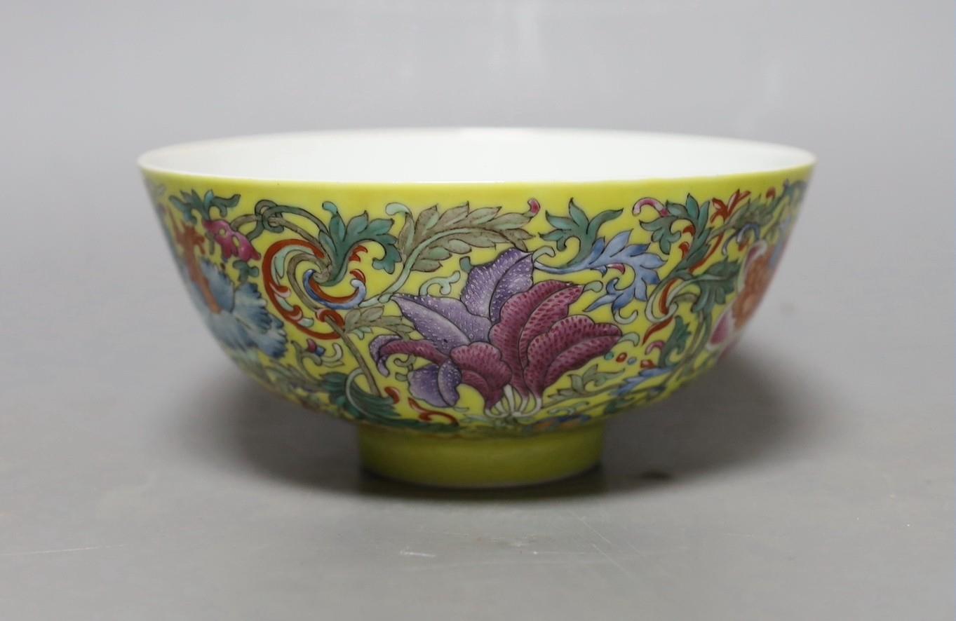 A Chinese yellow ground famille rose floral bowl, 15cm