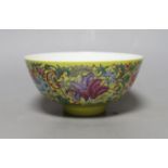 A Chinese yellow ground famille rose floral bowl, 15cm