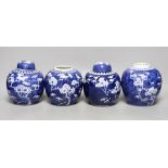 Four 19th / early 20th century Chinese blue and white prunus jars, 14cm