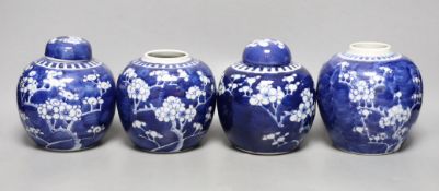 Four 19th / early 20th century Chinese blue and white prunus jars, 14cm