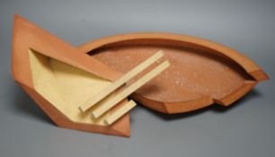 § § Martin Smith (b.1950), two disk forms, redware, one damaged, with original purchase receipt,