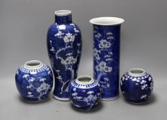 Two 19th / 20th century Chinese blue and white prunus vases and three jars, tallest 29cm