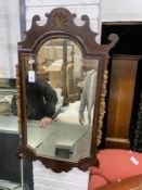 An early 20th century George III style parcel gilt fret cut mahogany mirror (a.f.), width 60cm,