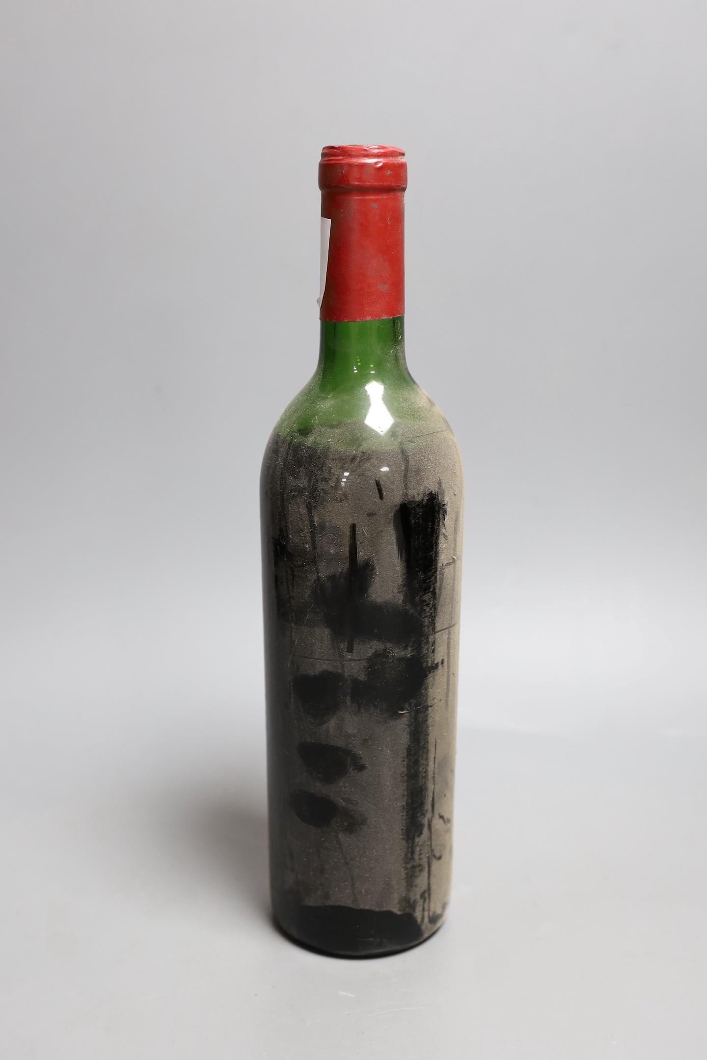 A bottle of Chateau Latour, date unknown, label missing