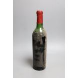 A bottle of Chateau Latour, date unknown, label missing