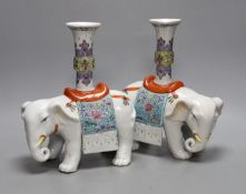 A pair of Chinese enamelled porcelain ‘elephant’ vases, 27cm high
