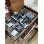 A quantity of 'The Just Slate Company' table mats, runners and coasters, all boxed