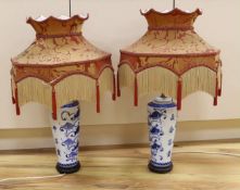 A pair of Chinese blue and white ‘fish’ lamps
