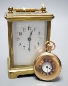 A brass carriage timepiece together with a gold plated pocket watch