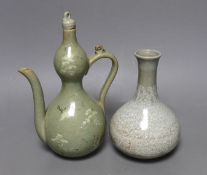 A Korean celadon wine pot and a similar vase, tallest 22cm