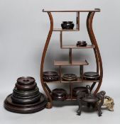 A Chinese wood shelf and various wood stands, tallest 45cm