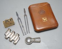 Tuning forks etc. In a leather ‘White Horse’ cigar case