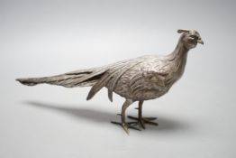 A 20th century Spanish white metal free-standing model of a pheasant, length 28.5cm, 148 grams.