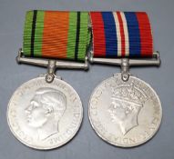 WW2 defence and war medals with miniatures, box of issue named to Flt / Lt M T Judson together