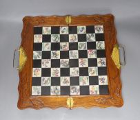 A Chinese chess set with resin pieces, 39x39cm