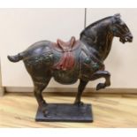 A Chinese carved and painted wood horse, 56cm tall